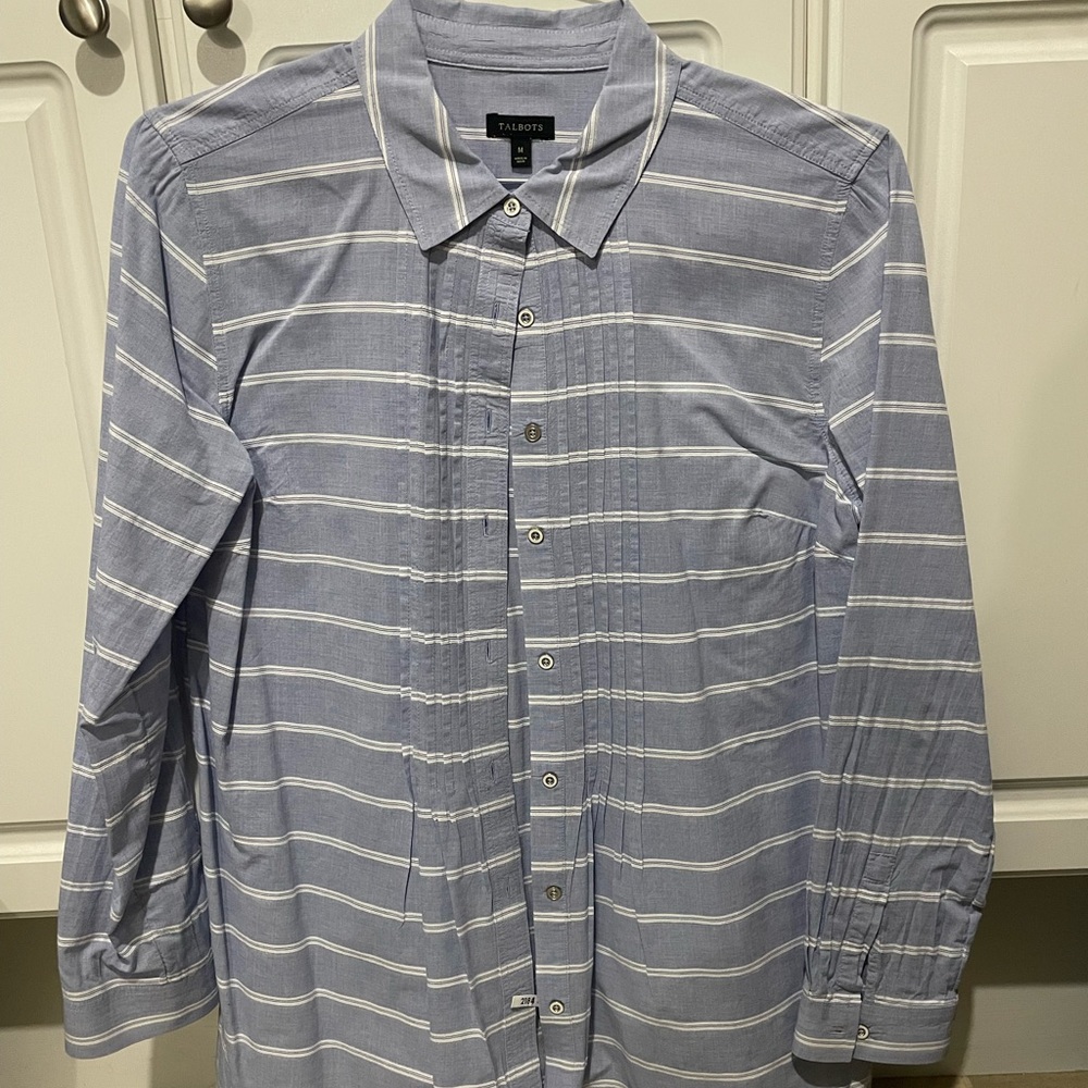 Women’s medium light blue with white striped button-down tailored shirt.